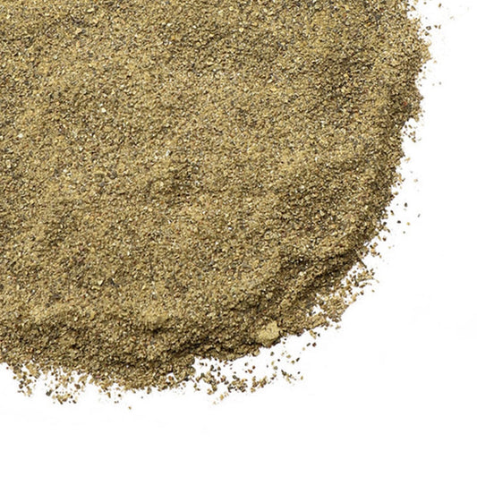 Close-up of a pile of light brown powder on a white background