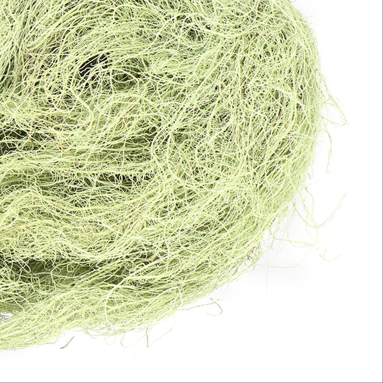 Ball of green stringy material with Grassroots Herb Supply logo on a white background