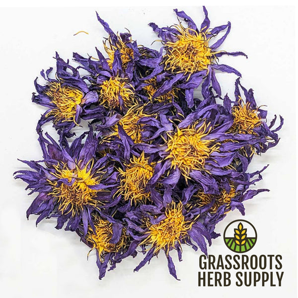 Purple flowers with yellow centers on a white background, branded with Grassroots Herb Supply.